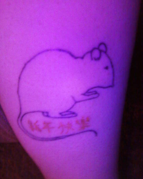 Tat under blacklight tattoo