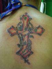 cross with vine tattoo