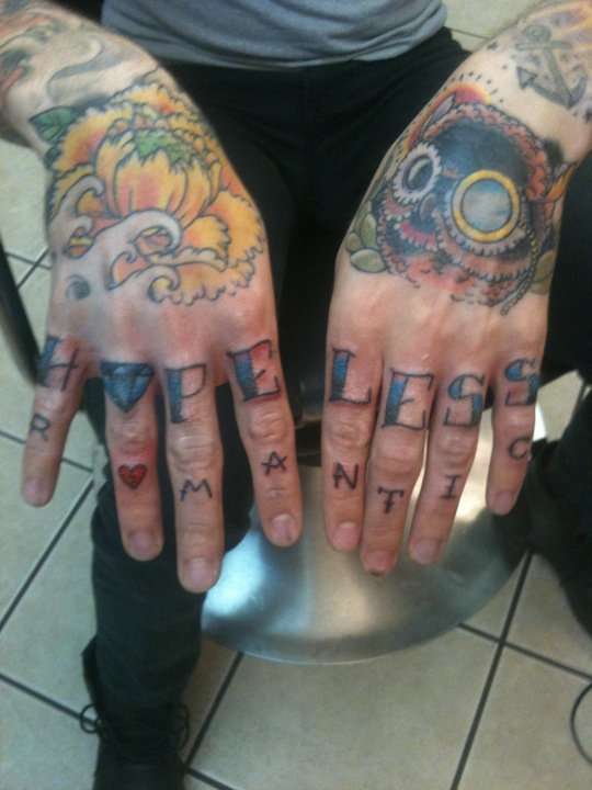 hands and knuckles tattoo