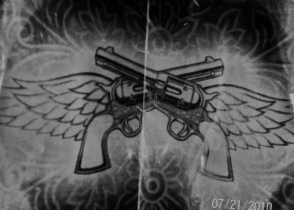 pistols with wings tattoo
