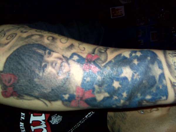 portrait done by phil albares tattoo