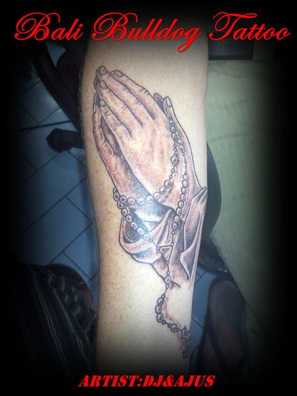 praying hand tattoo