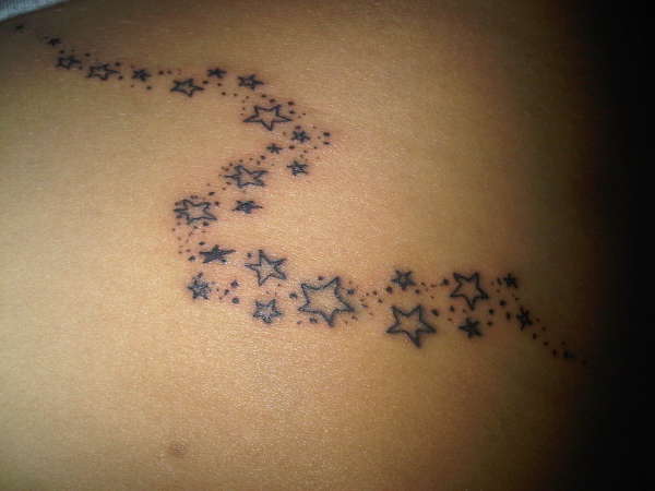 stars on stomach tattoo