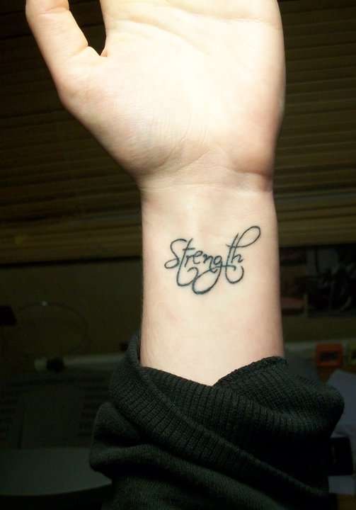 strength tattoos on wrist