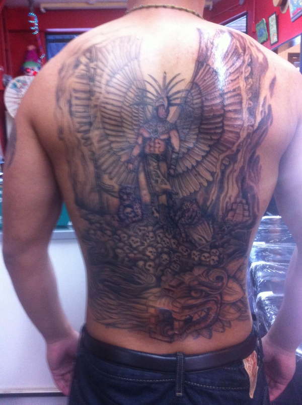 Aztec piece tattoo