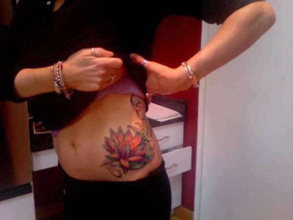 Glowing lotus tattoo
