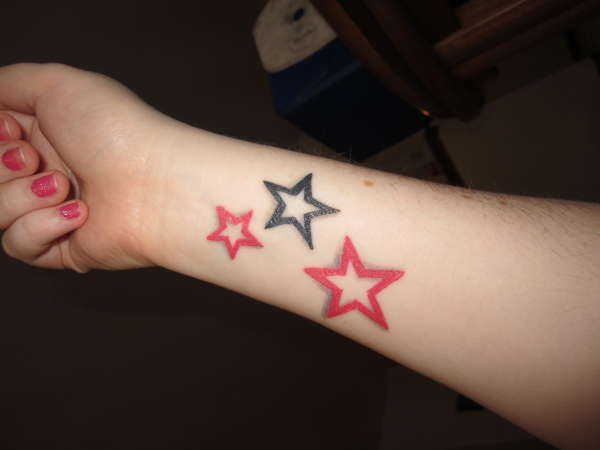 Pink and Black Stars tattoo