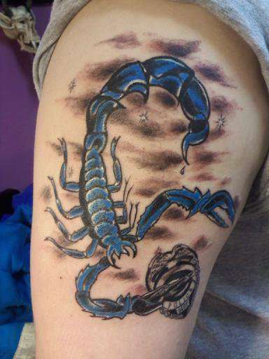 Scorpion with Badge tattoo