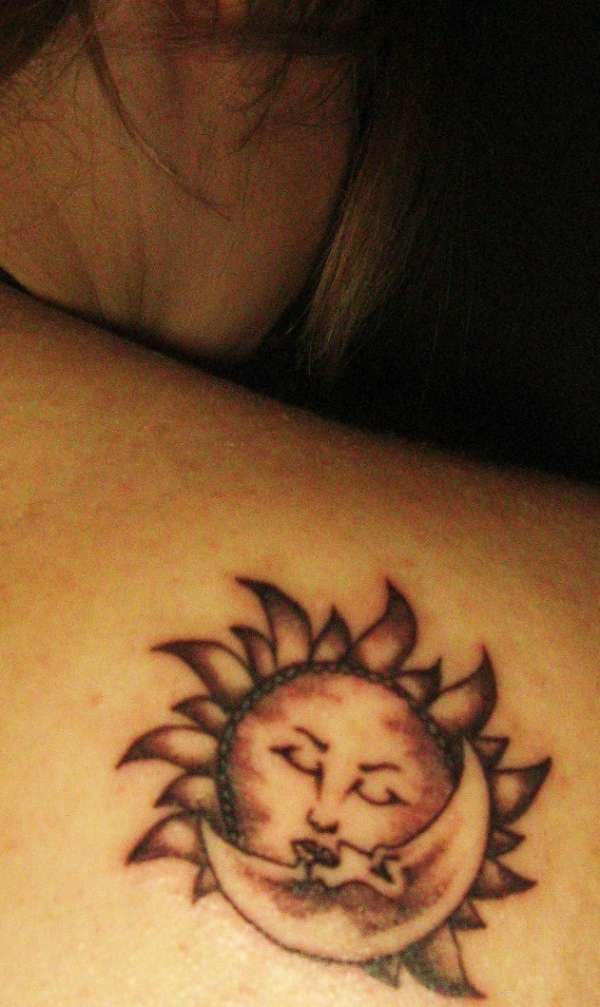 The impossible kiss between the Sun and the Moon tattoo