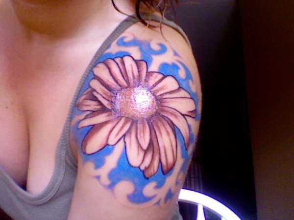 Top of shoulder flower tattoo