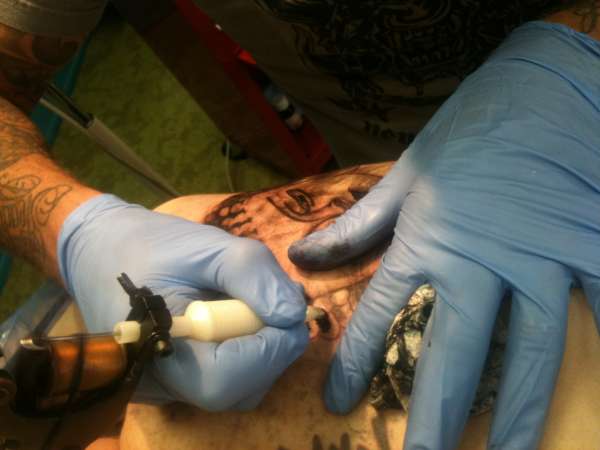 action picture tattoo