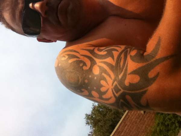 cover up tat on right arm tattoo