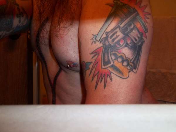 guns/razor/brass knuckles tattoo