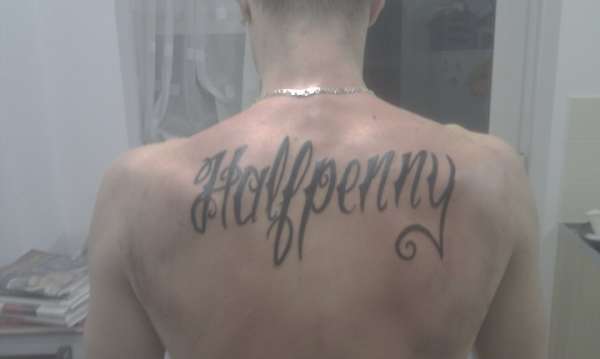 halfpenny across back tattoo