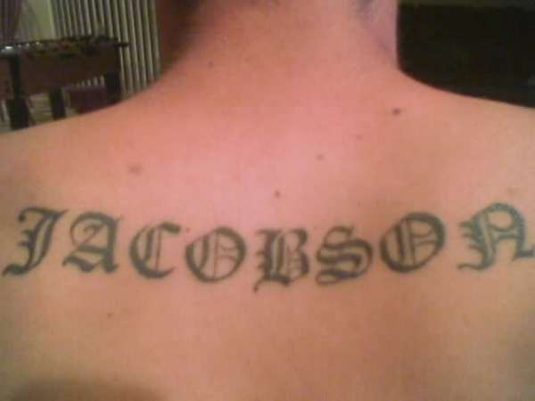 Last Name Lettering tattoo