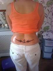 lower back,with chinese name tattoo