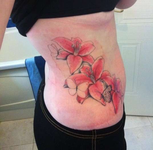 pink lilies tattoo