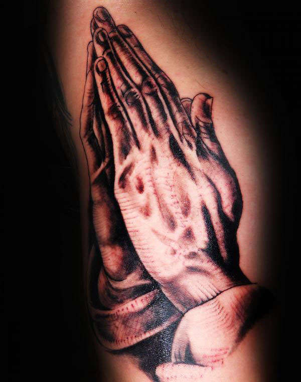 praying hands tattoo