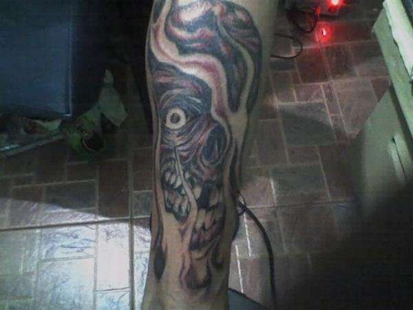 skull tattoo done by jan oliveros tattoo
