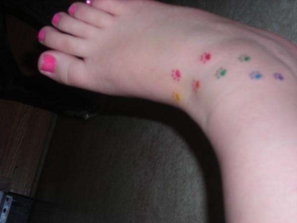 Colorful Puppy Paw Prints tattoo