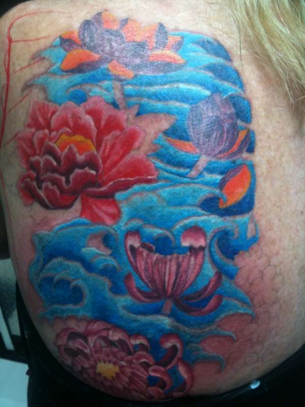 Flowers and water tattoo