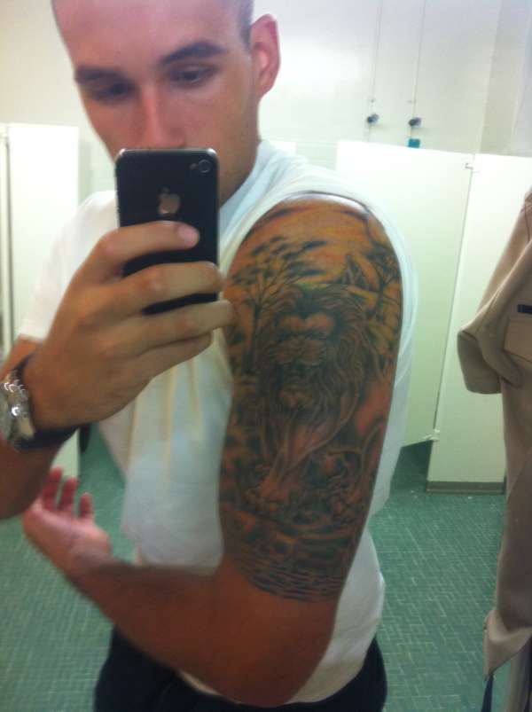 Lion half sleeve tattoo