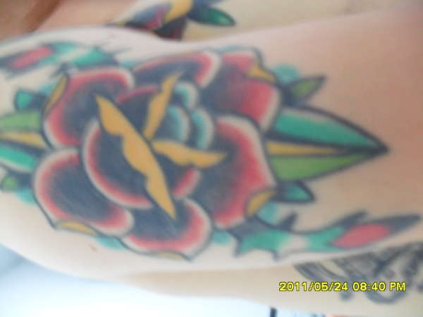 Outter rose tattoo