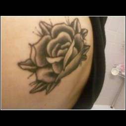 Rose on my upper back tattoo