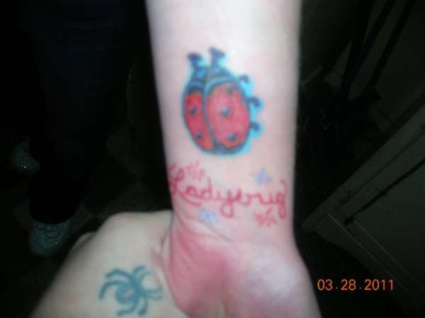 a ladybug tattoo