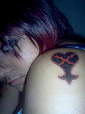 a woman so "heartless" tattoo
