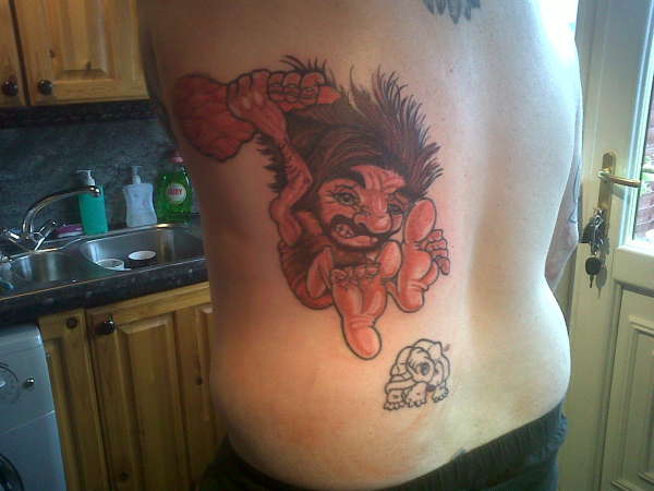 caveman tattoo