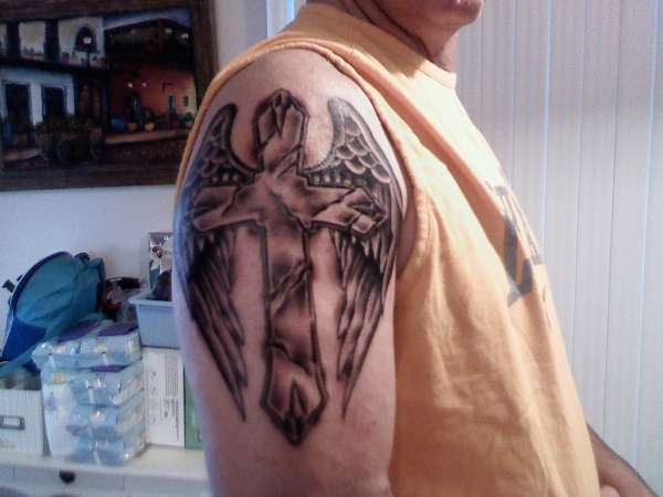 cross and wings tattoo