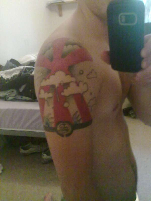 dripping clouds tattoo