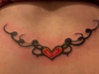 heart trampstamp tattoo