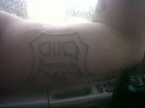 reppin the D tattoo