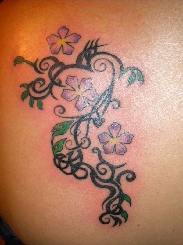 tribal flowers tattoo
