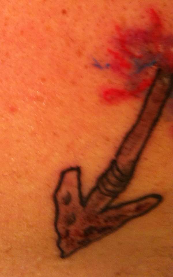 Arrow exit wound (right shoulder) tattoo