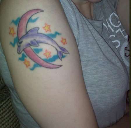 Dolphin and crescent moon tattoo