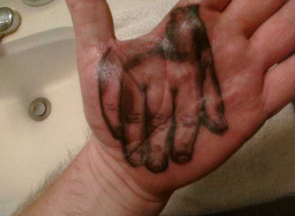 Hand in Hand tattoo