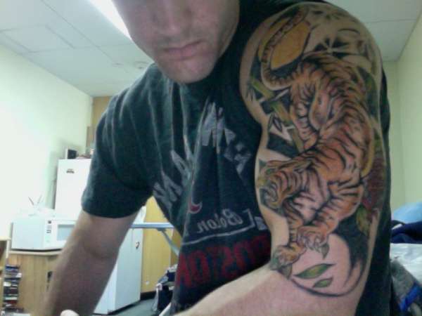 Japanese style tiger half sleeve tattoo