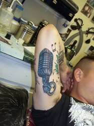 Microphone tattoo