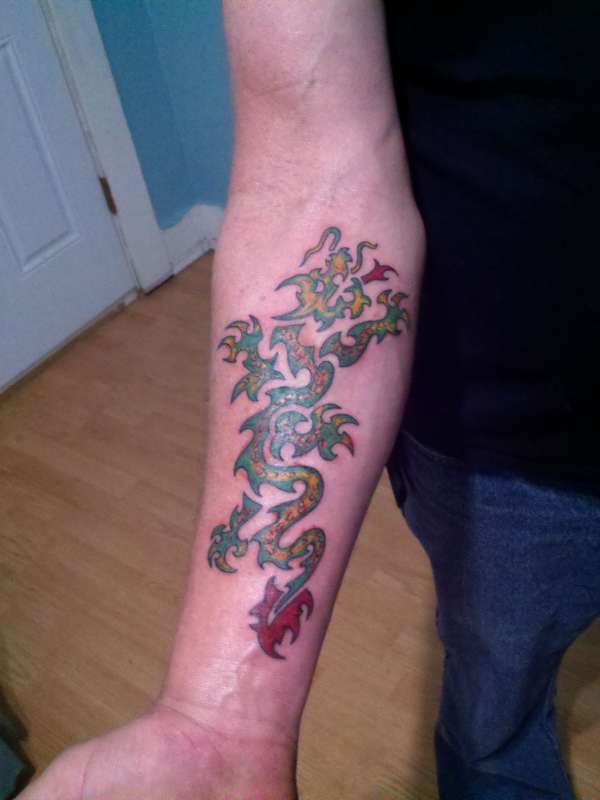 Segmented dragon tattoo