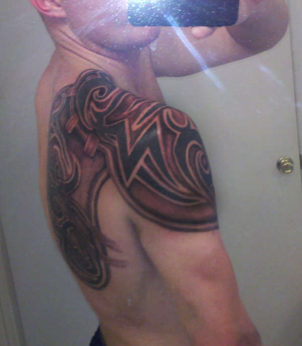 Tribal armor back tattoo