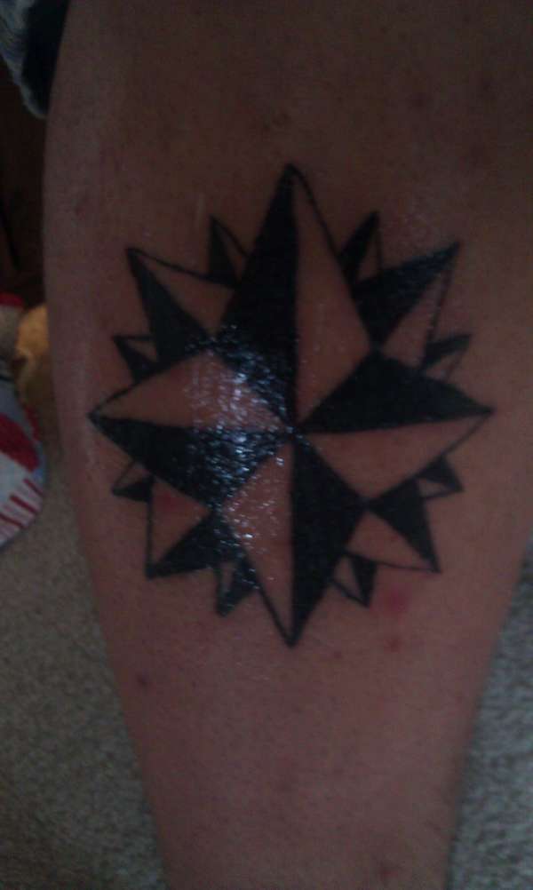 black and white star tattoo