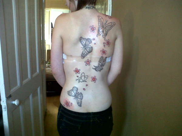 butterflys and cherry blossoms on back tattoo