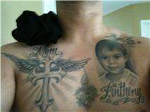 cross and a potrait of my son tattoo