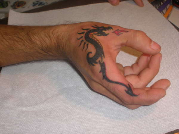 dragon in hand tattoo