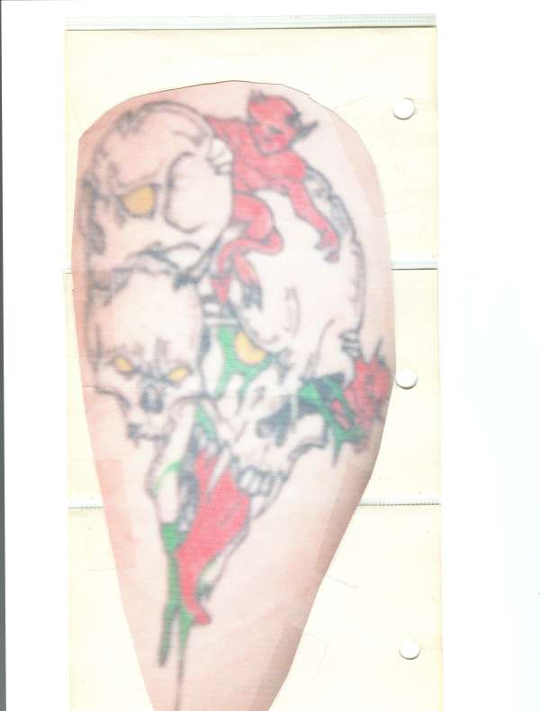 skulls and demons tattoo