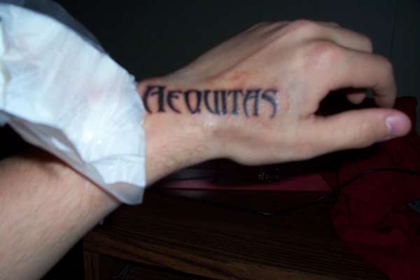 Justice tattoo