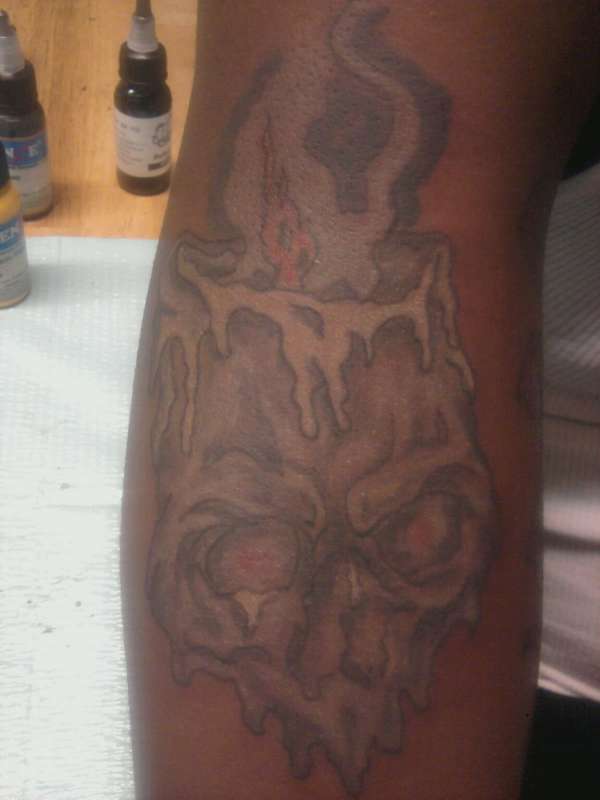 melted tattoo
